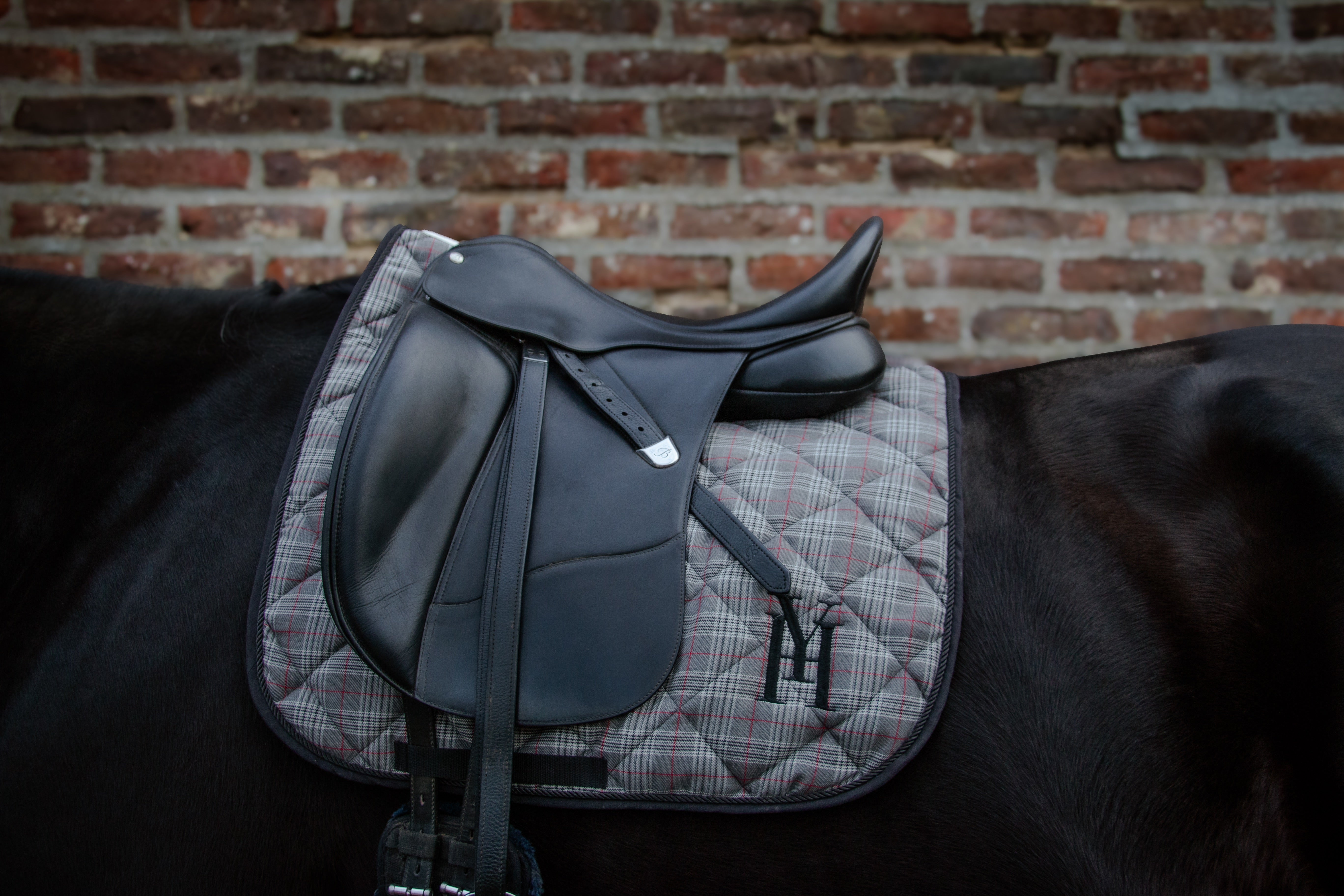Grey checked saddle pad