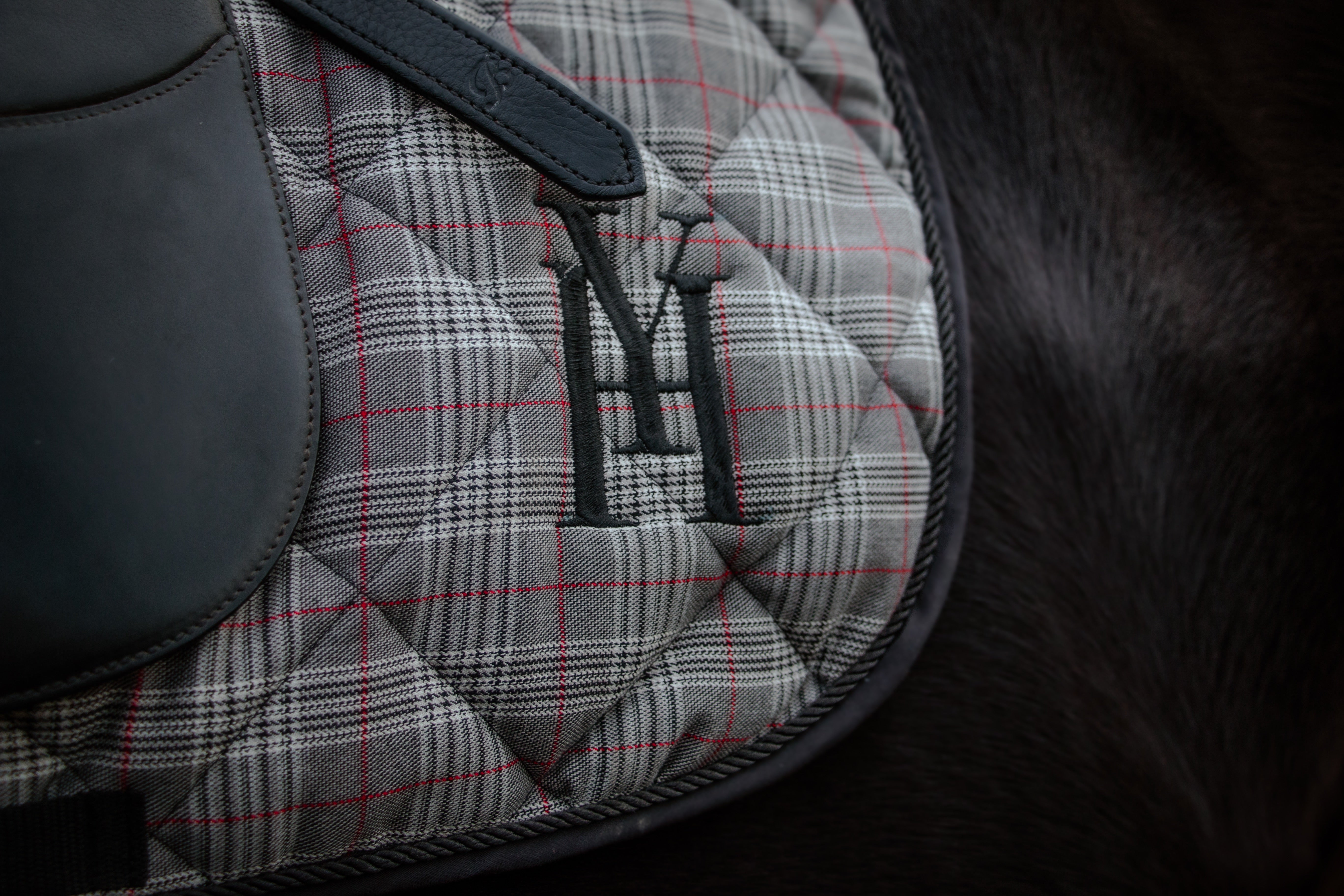 Grey checked saddle pad